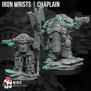 May include: Two unpainted gray resin tabletop gaming miniatures labeled IRON WRISTS | CHAPLAIN. The figures feature intricate mechanical armor, skull motifs, and heavy weaponry, including a large staff and a pistol, standing on rocky bases.