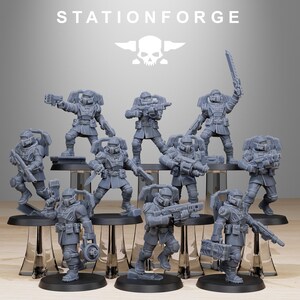 May include: A set of ten grey unpainted miniature soldier figurines from StationForge. Each figure wears tactical armour, a helmet with a visor, and a backpack. They are posed in various action stances, holding rifles, pistols, or melee weapons.