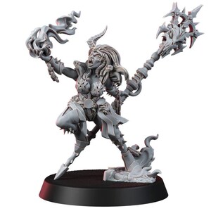May include: A grey unpainted miniature figurine of a horned warrior in a dynamic pose. The figure holds a flaming orb in one hand and a large, ornate staff topped with a skull-like design in the other, standing on a circular black base.