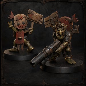 May include: Two miniature goblin figures on circular black bases. One figure wears a wooden mask with a jagged mouth and holds a wooden sign. The other figure has green skin, wears goggles, and holds a large metallic firearm with both hands.