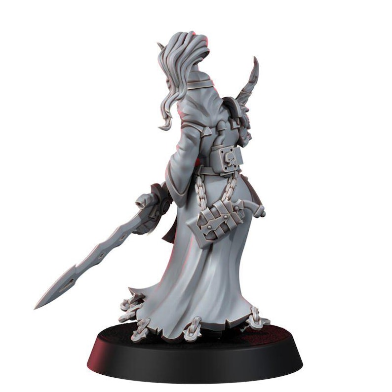 May include: A gray unpainted miniature figure of a character wearing a long flowing robe with a high collar and long hair. The figure holds a long sword in one hand and has a small pistol holstered at the hip, with a skull emblem on the back belt.