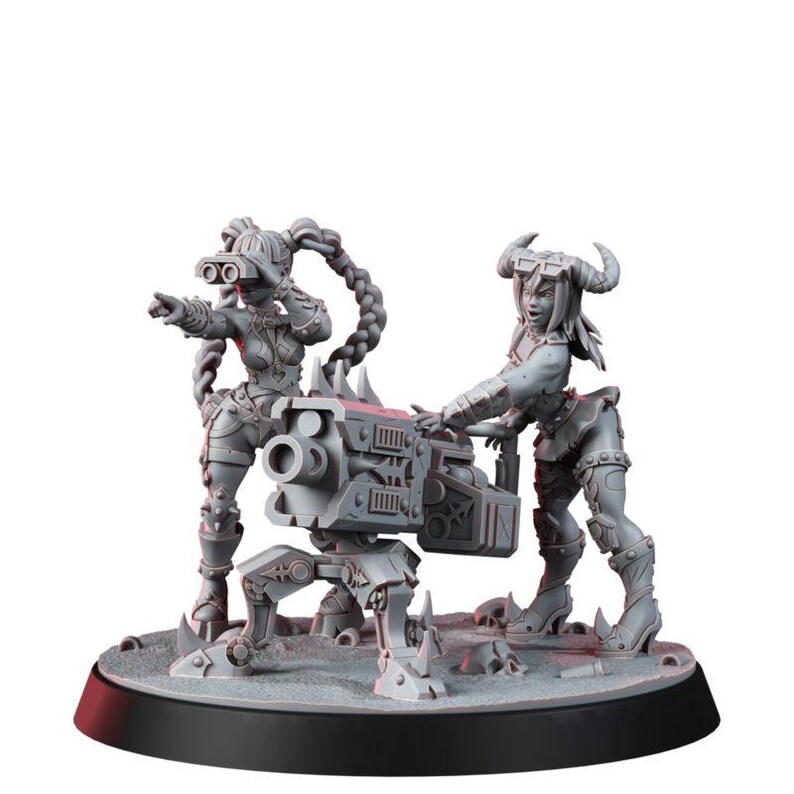 May include: A grey miniature figurine set featuring two figures operating a heavy mounted cannon. One figure stands pointing while wearing goggles, and the other stands beside the weapon with horns on their head. Both figures wear armour.