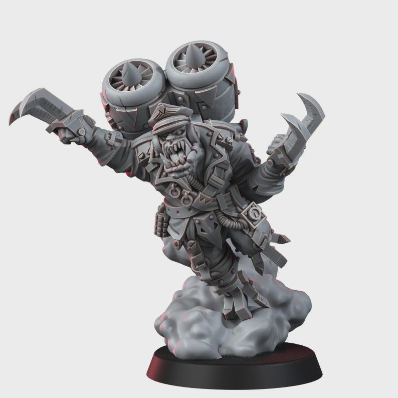 May include: A gray unpainted miniature figure of an orc wearing a military-style cap and uniform, equipped with a large jetpack featuring two prominent turbines on the back. The figure has sharp claws on both hands and is mounted on a cloud base.