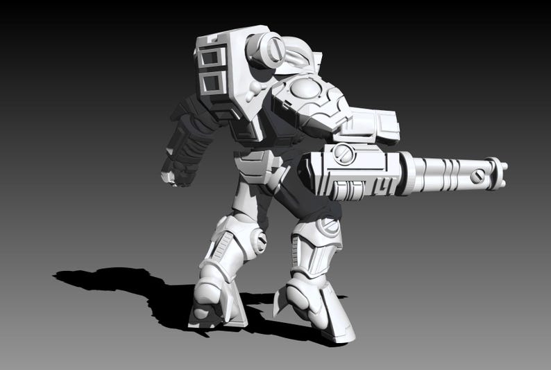 May include: A white, unpainted 3D-printed miniature figure of a futuristic soldier in heavy armor. The figure features a large backpack, a helmet, and a prominent multi-barreled weapon attached to the right arm, standing in a dynamic pose.