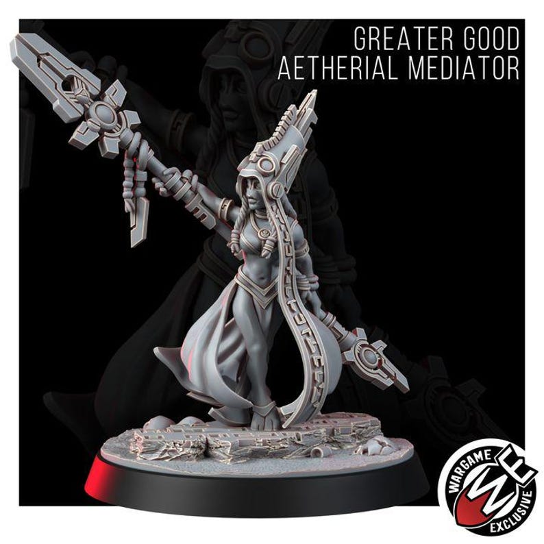 May include: A gray miniature figurine titled Greater Good Aetherial Mediator, featuring a character in a tall headdress holding a long staff with geometric details. The figure stands on a textured base with a Wargame Exclusive logo in the corner.