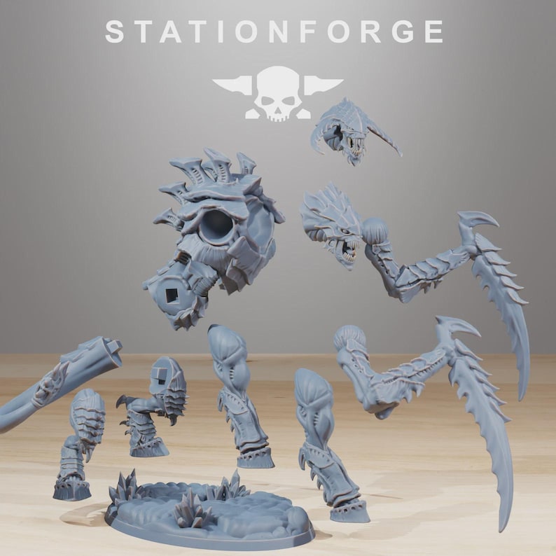 May include: A gray resin model kit featuring the text STATIONFORGE and a skull logo. The kit includes a torso, two serrated scythe-like arms, two legs, a head, and a textured oval base. These unpainted components are designed for assembly.