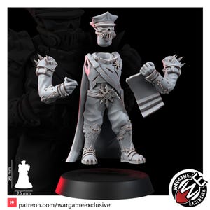 May include: A grey resin miniature figure of a soldier with a skull-like face, wearing a peaked cap and a cape. The figure includes separate arms, one holding a small object and the other a scroll. A scale graphic shows a height of 36 mm and 25 mm width.