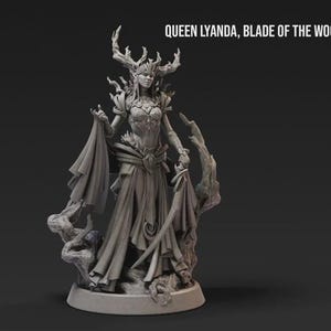 May include: A detailed gray figurine of Queen Lyanda, Blade of the Woods, with antlers and flowing robes. The figure is holding a sword and draped fabric. The text "QUEEN LYANDA, BLADE OF THE WOODS" is above the figure.