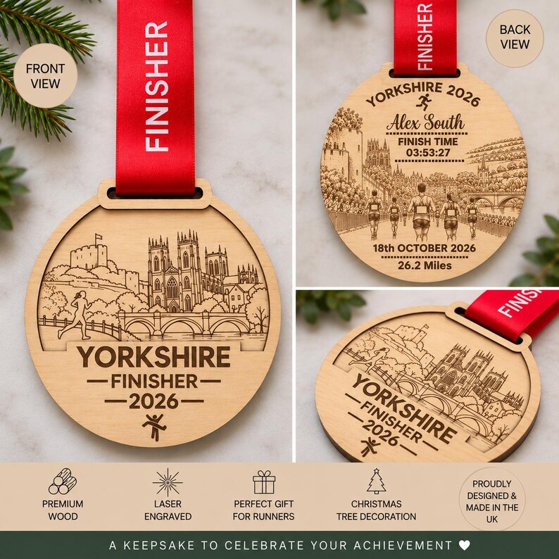 May include: A round wooden finisher medal with a red ribbon, featuring a laser-engraved illustration of a cathedral and bridge. The text reads YORKSHIRE FINISHER 2026. The back view shows personalized details including a name, finish time, and 26.2 Miles.