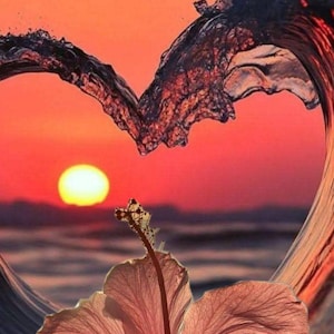 May include: A vibrant image of a sunset over the ocean, with a heart-shaped wave in the foreground. A pink hibiscus flower is in the lower portion of the image, adding a touch of nature's beauty to the scene.