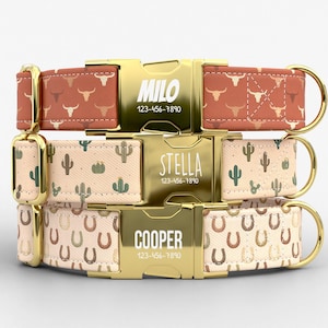 May include: Three personalized dog collars with gold-colored buckles. The top collar has a rust-colored background with bull skull patterns. The middle collar has a beige background with cactus patterns. The bottom collar has a beige background with horseshoe patterns.