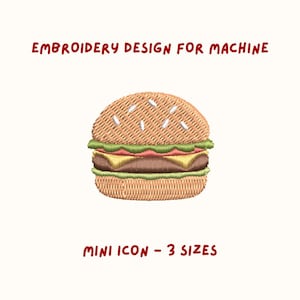 May include: An embroidered burger design for machine embroidery. The burger features a textured bun, a patty, cheese, lettuce, and tomato. The text "EMBROIDERY DESIGN FOR MACHINE" and "MINI ICON - 3 SIZES" are in red.