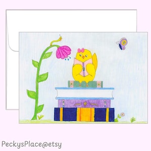 May include: A hand-drawn greeting card featuring a yellow chick with a pink bow reading a book atop a stack of books. A pink flower and butterfly are also depicted. The card is accompanied by a white envelope. Text on the bottom reads "PeckysPlace@etsy".