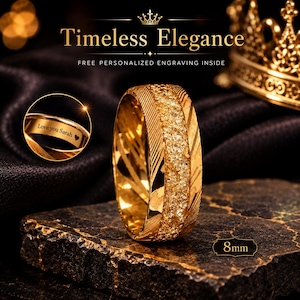 May include: A gold-colored ring with a textured center band and diagonal grooves on the sides. The ring is 8mm wide. An inset circle shows the interior engraving reading Love you Sarah with a heart symbol. The text Timeless Elegance is visible.