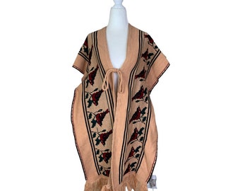 Gebreide poncho met vogelprint uit de jaren 70