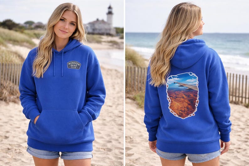 May include: A royal blue hoodie with a front pocket and a hood. The front of the hoodie has a small patch that says "Window Seat Club". The back of the hoodie has a graphic of an airplane wing over a canyon.