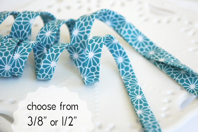 double fold geometric flower on turquoise CHOOSE 38 or 12 wide 3 yards bias tape