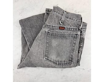 Calça jeans vintage Rustler masculina, tamanho 29x29, denim preto desbotado, corte reto.