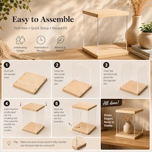 May include: A square display case featuring a light wood base and top with clear acrylic side panels. The image includes instructional text titled Easy to Assemble, showing five numbered steps for inserting panels into the wooden base slots.