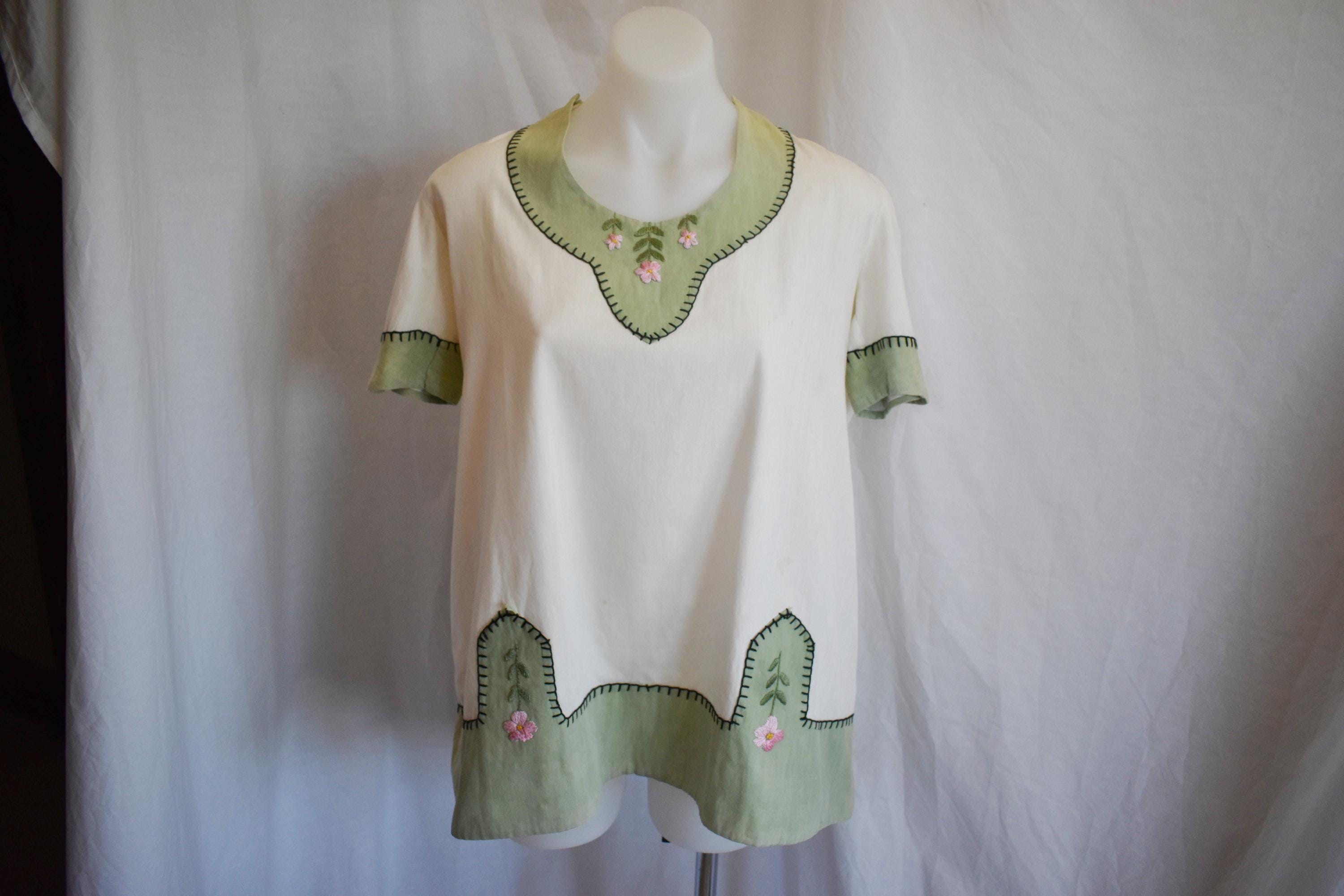 Vintage cotton tunic with embroidered flowers and blanket stitching