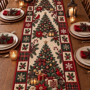 May include: A rectangular quilted table runner featuring a festive Christmas theme with decorated pine trees, red poinsettias, cardinals, candy canes, lanterns, and wrapped gifts, bordered by a red and green plaid pattern with snowflake motifs.