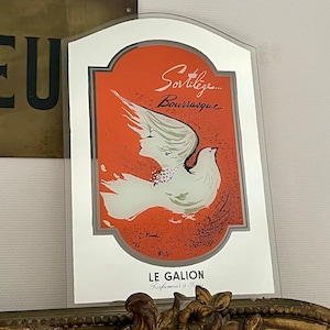 Vintage French perfume advertisement - woman and bird illustration - Paris Sortilèges 1950s Bourrasque - Claude Maurel illustration