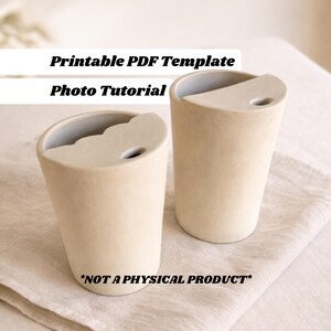 May include: Two beige ceramic tumblers with a unique angled top design and a small hole. The tumblers are displayed on a white cloth. Text on the image reads "Printable PDF Template Photo Tutorial" and "*NOT A PHYSICAL PRODUCT*".