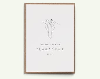 May include: A white card with a black line drawing of a suit and tie. The text on the card reads "Mochtest du mein Trauzeuge sein?" which translates to "Would you be my best man?"