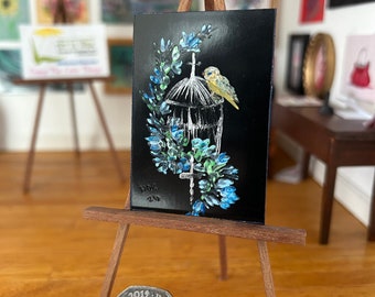 Birdcage Dollhouse modern miniature. Flowers and a bird on a birdcage feature in this  original 112th Scale painting