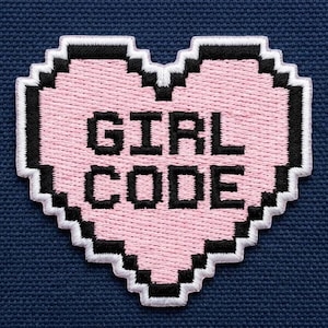 May include: A pink heart-shaped patch with the words "GIRL CODE" embroidered in black pixelated letters. The patch has a white and black border and is set against a navy blue background. This patch is perfect for jackets, bags, or other accessories.