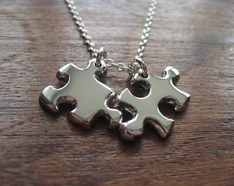 Two Miniature Chunky Silver Puzzle Piece Pendants