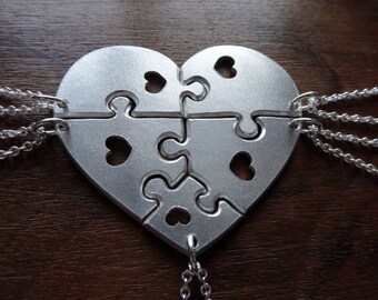 Heart shaped jigsaw puzzles with hearts pendants necklaces, satin finish