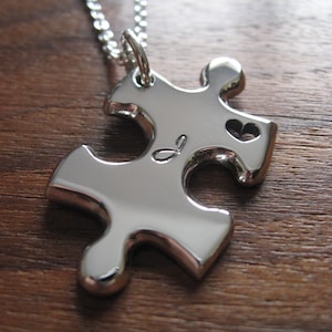 A Handmade Silver Puzzle Piece Pendant Necklace with Handcut Heart and Initial image 1