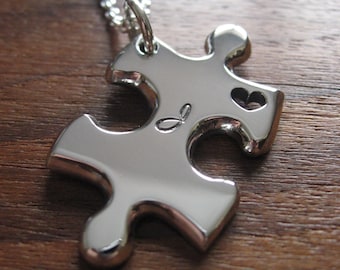 A Handmade Silver Puzzle Piece Pendant Necklace with Handcut Heart and Initial