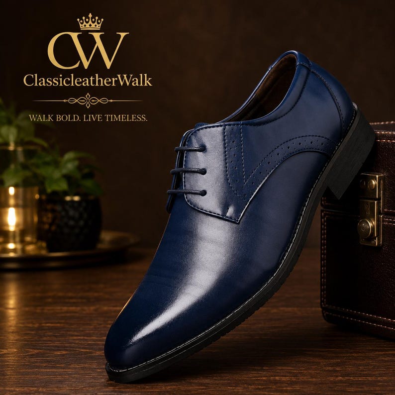 May include: A navy blue leather oxford shoe with a pointed toe, black laces, and subtle perforated detailing along the side panel. The shoe features a low black heel and a smooth finish. The text ClassicleatherWalk is visible in the upper left.