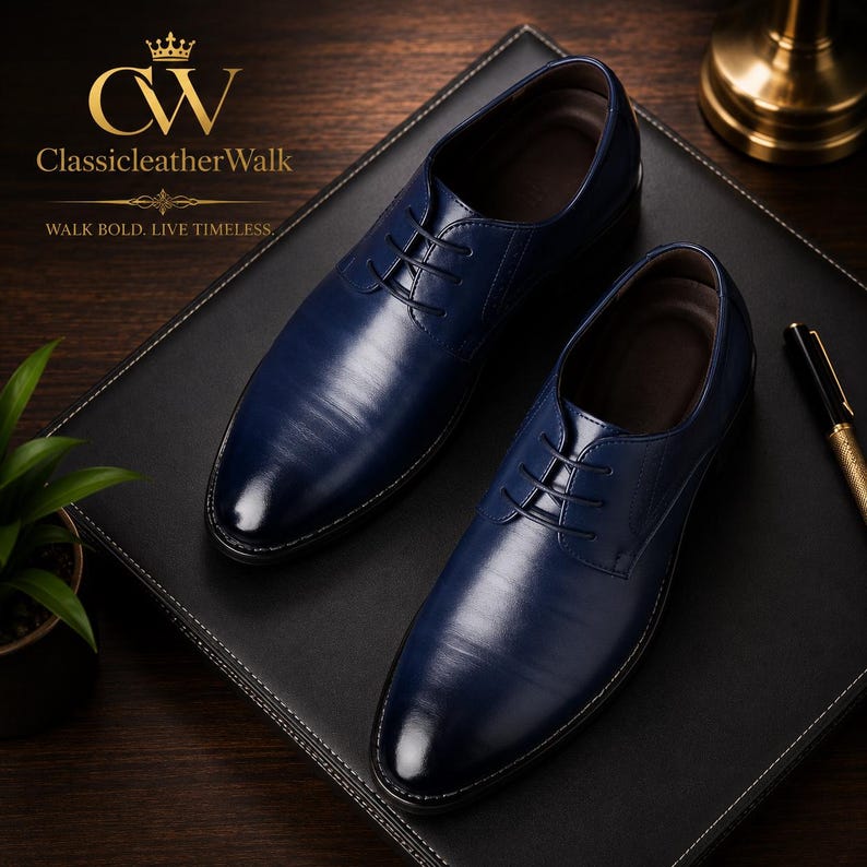 May include: A pair of dark blue leather oxford shoes with black laces and a smooth, polished finish. The logo for ClassicleatherWalk with the text "WALK BOLD. LIVE TIMELESS." is visible in the upper left corner of the image.