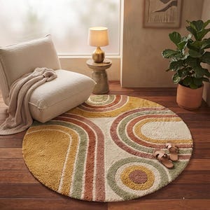 Ronde boho regenboog getufte vloerkleed in mid-century modern stijl met kleurrijke uitstraling, cirkelvormig tapijt, vintage jaren 70 zonnestralen vloerdecoratie, zachte badmat
