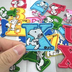 Snoopy Alfabet Stryk-på-lappar | Broderad jordnötter tecknad applikation (A-Ö)