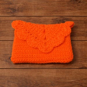 May include: A distressed wooden sign, inscribed with 'Welcome to our home' in a handwritten font. The sign has a rustic finish, ideal for adding a welcoming touch to any entrance.