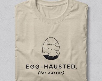 Ägg-hused T-shirt, minimalistisk påskt-shirt, introvert humor, grafik med spruckna ägg