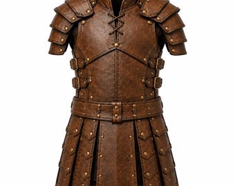May include: A brown faux leather chest armor piece featuring layered shoulder pauldrons, a lace-up front neckline, and side buckle straps. The garment includes a waist belt and a tasset skirt with vertical panels, all accented with brass-toned studs.