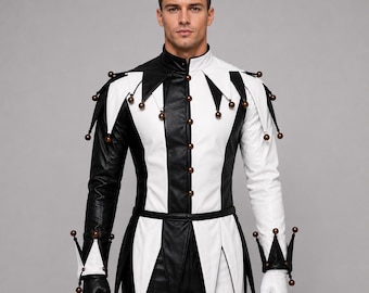 May include: A long-sleeved jacket featuring a black and white vertical color-blocked pattern. The garment includes a high collar, a front button closure, and pointed shoulder and hem panels adorned with small, round, metallic-toned dangling beads.