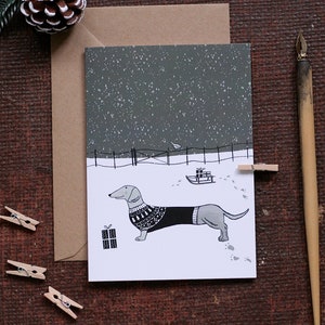 Carte de Noël pour chien Teckel dans la neige