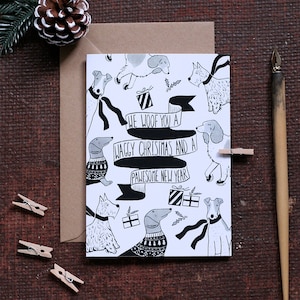 Carte de Noël de chien 'We Woof You A Waggy Christmas'