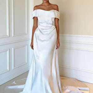 strapless ruched mermaid tulle wedding dress F221053 Classic Sweetheart Strapless Ruched Pearl Organza Mermaid Gown with Hand Draped and Tacked Full Circle Skirting