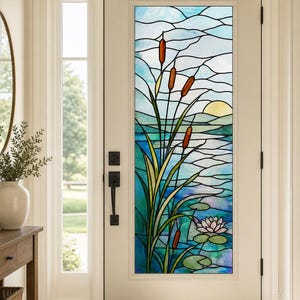 May include: A white front door featuring a tall, rectangular stained glass insert. The glass depicts a landscape with a blue lake, green cattails with brown heads, a pink water lily on lily pads, and a yellow sun against a light blue sky.