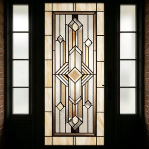 May include: A decorative stained glass door with a geometric design. The door features a central panel with a symmetrical pattern of diamonds, rectangles, and lines in shades of beige, brown, and clear glass. The door is framed by black trim and sidelights.