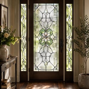 May include: A dark wood front door featuring a central stained glass panel with a floral motif in green and clear textured glass, flanked by two narrow vertical sidelights with matching glass patterns and small circular accents.