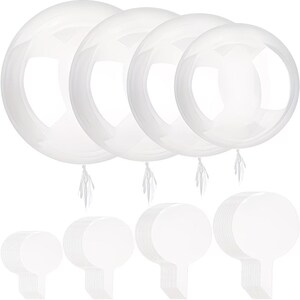 May include: A collection of clear, round balloons with attached ribbons, and a stack of white, round balloon weights. The balloons are transparent, allowing a view through them. The weights are flat and circular with a handle.