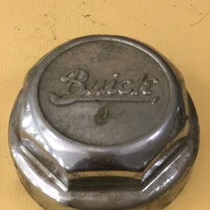 1950s Buick front wheel dust cover